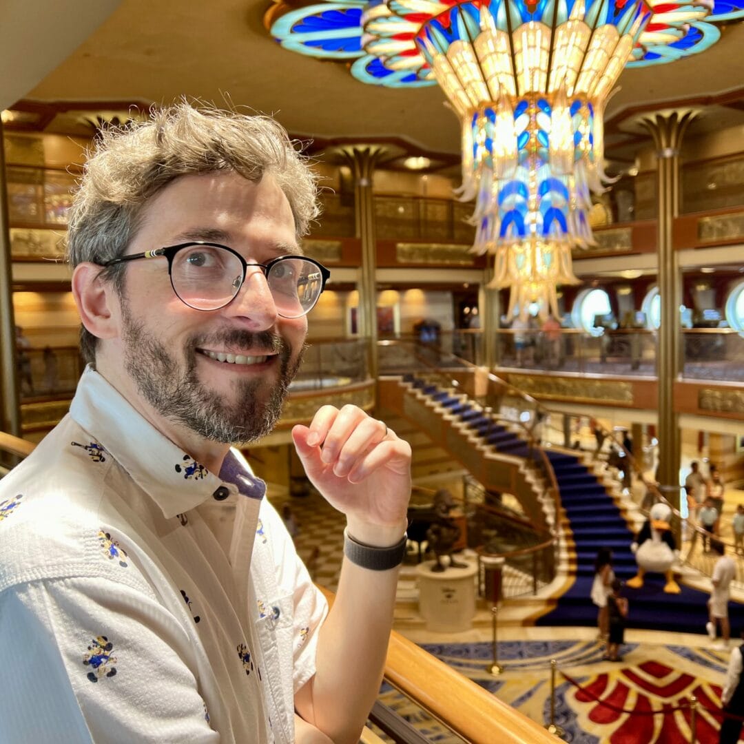 Andrew overlooking the Disney Dream atrium Andrew overlooking the Disney Dream atrium