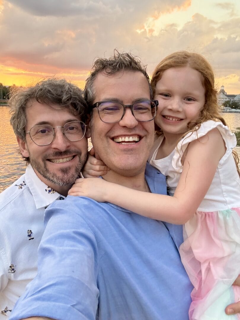 Chris and the Second Star family in front of the Boardwalk resort at sunset